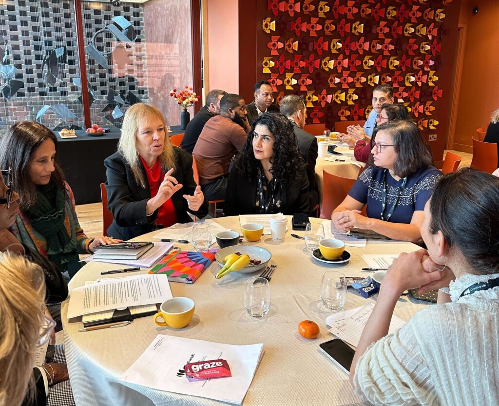 International Delegation at table